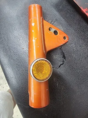 NOS honda cb100 fork ear